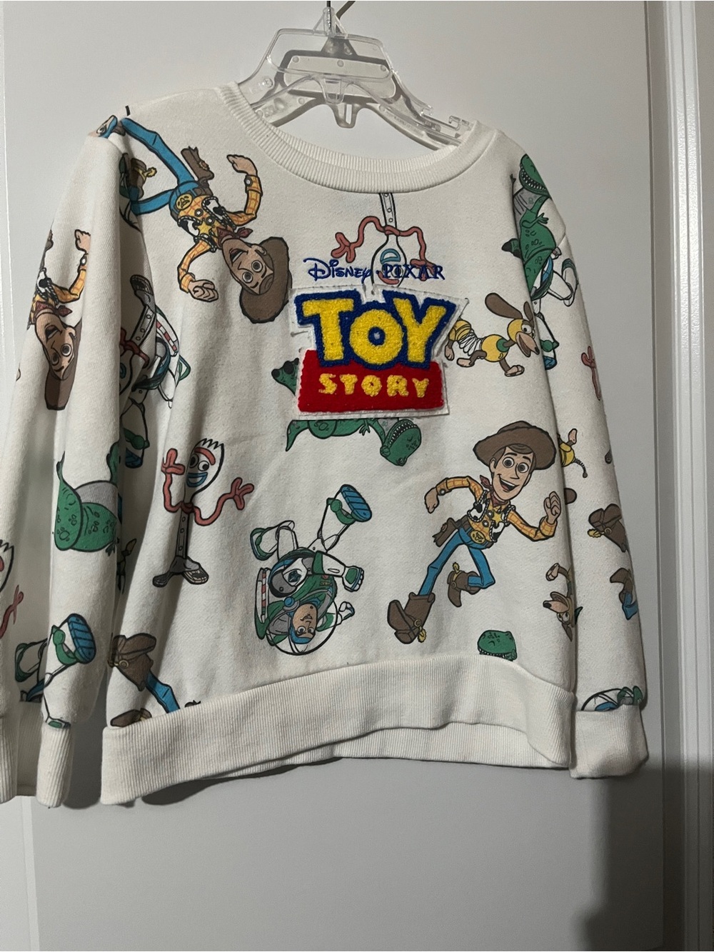 Disney White Toy Story Crewneck Sweatshirt with Multicolor Character Print